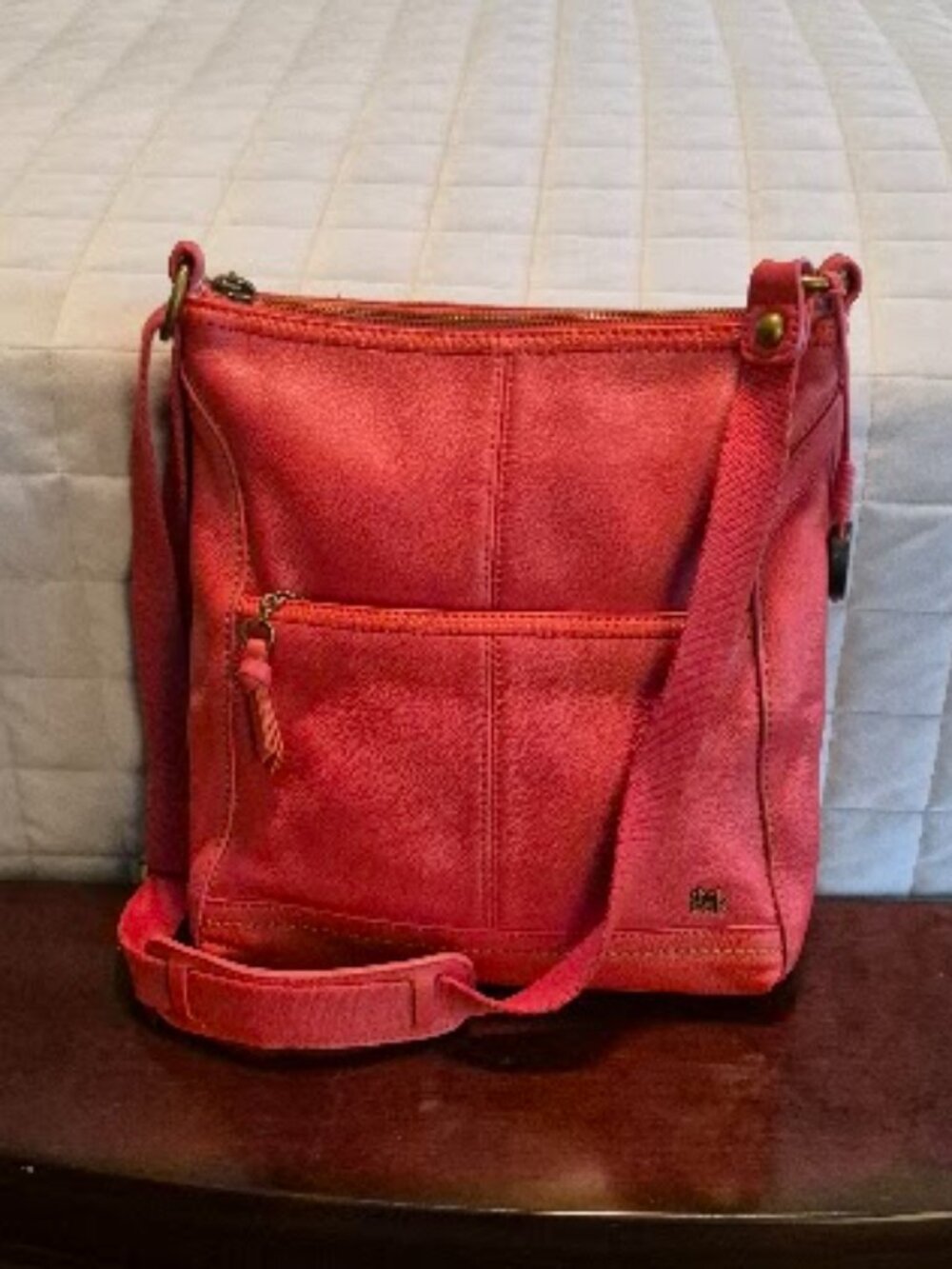 Women's The Sak crossbody orange leather bag with zipper closure